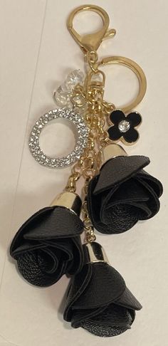 SUPER FAST FREE SHIPPING! THIS CAN BE DONE IN SILVER OR ROSE GOLD AS WELL A DEFINITE EYE CATCHER!! CHARM HAS GOLD CENTER ON ONE SIDE AND CRYSTAL CENTER ON OTHER SIDE APPROXIMATELY 7" LONG - I CAN MAKE IT SHORTER OR LONGER! JUST ASK! ABSOLUTELY STUNNING!! HANG IT IN YOUR CAR! Elegant Bag Charm With Lobster Clasp As Gift, Elegant Bag Charm With Lobster Clasp For Gift, Elegant Gold Bag Charm For Gift, Elegant Gold Bag Charm As Gift, Luxury Bag Charm With Keychain, Elegant Bag Charm With Charms As Gift, Elegant Bag Charm With Logo, Leather Rose, Crystal Bags