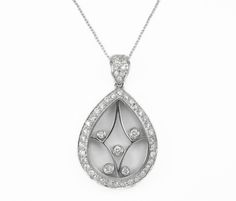 Elegantly displayed is a unique, diamond white gold 'movement' pendant. This modern piece is eye-catching from every and any angle. In their center, five brilliant round diamonds are bezel set in a see-through setting, moving freely. A crystal allows light to pass through the pendant and also adds to its unique allure. Pave set diamonds are found on the bale and pear shape gold walls. This gorgeous piece is made in 18k white gold. Gold: 18K White Gold / 9.4 Grams Setting Style: Pave/Bezel Stone: Luxury White Diamond Necklace With Polished Finish, Platinum Pendant Necklace With Single Cut Diamonds, Formal Diamond White Necklace With Polished Finish, Luxury Diamond Oval Pendant Necklace, Luxury Silver Diamond Teardrop Pendant Necklace, Luxury Pendant Diamond Necklace With Single Cut Diamonds, Luxury Cubic Zirconia Teardrop Diamond Necklace, Luxury Silver Teardrop Pendant Diamond Necklace, Platinum Pendant Diamond Necklace In Fine Jewelry Style