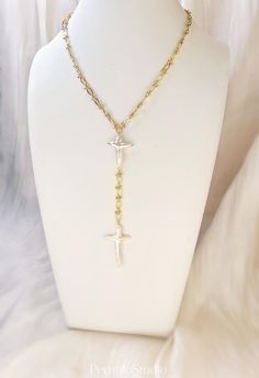 This stylish cross pearl necklace can be strong statement chain in your jewelry collection. The cross is a nucleated pearl, giving it a baroque shape, but each pearl is hand-selected for high quality.  The cross-shaped pearl adds a unique touch, making it a perfect gift for Easter, Thanksgiving, and church. MATERIAL - Pearl: HAND PICK  Freshwater baroque pearls in cross-shaped - Pearl Size; top 20-30mm/ bottom 30-45mm/   1.  The chains are 18k gold plated ( 16inches + 2 inches extension chain/ about 4.5 dropping chain with the cross pearls )  O T H E R ∙ I N F O R M A T I O N ✨ Our pieces are made with care and attention to details. ✨ Natural freshwater pearls may have their own unique shapes or slight imperfections, but they do not affect wearability. ✨ The orders typically take 3-5 days Elegant Pearl Drop Cross Pendant Necklace, Elegant Cross Necklace With Pearl Drop, Elegant Cross Pendant Necklace With Pearl Drop, Elegant Gold Cross Necklace With Pearl Pendant, Elegant Cross Necklace With Pearl Chain, Elegant White Cross Necklace With Pearl Chain, Elegant Cross-shaped Pearl Chain Necklace, Pearl Chain Cross Pendant Necklace Gift, Gift Pearl Chain Cross Pendant Necklace