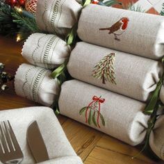 a stack of christmas napkins with birds on them