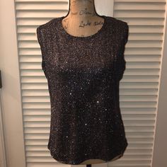 Beautiful Glittery Black/Rainbow Colored Sleeveless Top By Ronni Nicole. Pit To Pit Measures Approximately 19.25” Laying Flat And Length Is Approximately 22.5” From Top Of Shoulder To Hem. Nwt Condition! Sleeveless Shimmer Top For Party, Fitted Shimmer Tank Top For Night Out, Party Season Shimmer Tank Top, Sparkling Sleeveless Top For Night Out, Fitted Shimmer Tank Top For Party, Glamorous Sleeveless Sparkling Tops, Sparkling Sleeveless Summer Tops, Sparkling Sleeveless Top For Summer, Glamorous Glitter Sleeveless Tops