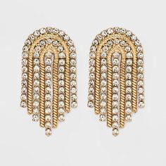 Add a little edge and sparkle to every ensemble with the SUGARFIX by BaubleBar Crystal and Gold Arch Statement Earrings. These statement earrings feature on trend curtain fringe crafted from gold hardware, and are dotted with dainty crystals for extra shine. With its unique shape and sleek movement, we're sure you'll wear this pair for many occasions. Disco Outfits, Glowforge Projects, Beige Fashion, Curtain Fringe, Rhinestone Fringe, Bead Embroidery Tutorial, Fairy Jewelry, Preppy Dresses, Embroidery Tutorial