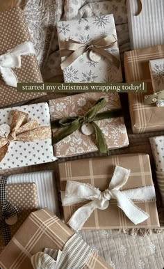 many wrapped presents are stacked on top of each other