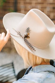 This hat is so much fun! Obviously we love that trendy wide brim style but it's that feather detailing that really won us over! Adjustable velcro inside for sizing Brim: 3.84 in Crown: 5.12 in Inner Circumference: 23.23 in Adjustable Winter Hat With Feather Trim, Winter Fedora Hat With Feather Trim, Winter Fedora With Feather Trim, Adjustable Beige Hat With Feathers, Fall Rodeo Hat Band With Feathers, Curved Brim Fedora With Feather Trim For Kentucky Derby, Winter Felt Hat With Feathers And Short Brim, Winter Felt Hat With Feathers And Flat Brim, Winter Feathered Flat Brim Felt Hat