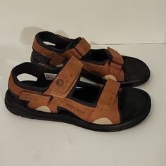 Never Worn Outside. No Scuff Marks Or Grime. Brown Non-slip Open Toe Sport Sandals, Brown Synthetic Open Toe Sport Sandals, Brown Cushioned Round Toe Sport Sandals, Brown Synthetic Slip-on Sport Sandals, Outdoor Brown Slip-on Sandals, Brown Open Toe Sandals For Outdoor Activities, Comfortable Brown Sport Sandals For Outdoor, Comfortable Brown Sandals For Outdoor Activities, Casual Brown Non-slip Sport Sandals