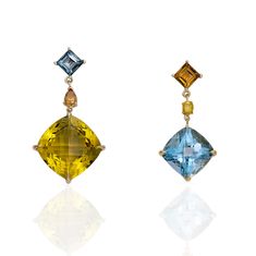 Evening Primrose earrings are designed to accentuate individuality with magnificent shades of golden citrine and London blue topaz. Delicate yet strong, these drops sparkle in the sunlight, dazzled with cognac and yellow diamond accents. 18k yellow gold Golden citrine, 14ctw London blue topaz, 9ctw Diamonds, 0.24ctw In stock Luxury Yellow Gemstone Earrings, Luxury Yellow Gold Topaz Earrings, Luxury Topaz Drop Earrings, Yellow Fine Jewelry Earrings With Gemstone Accents, Evening Primrose, London Blue Topaz, London Blue, Cuff Earrings, Yellow Diamond