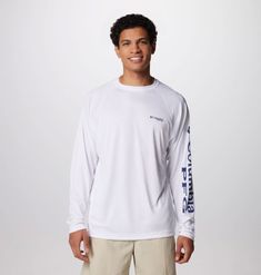 This classic long-sleeve fishing shirt features broad-spectrum UV protection, sweat-wicking, and quick-drying fabric for comfort and utility on and off the water. Casual Long Sleeve Tops For Water Sports, Casual Long Sleeve Rash Guard With Upf 50+, White Rash Guard With Upf 50+ For Sports, Casual White Rash Guard For Sports, White Rash Guard Upf 50+ For Sports, White Long Sleeve Rash Guard With Upf 50+, Casual Crew Neck Rash Guard For Outdoor, White Long Sleeve Tops For Outdoor Activities, White Long Sleeve Moisture-wicking Rash Guard