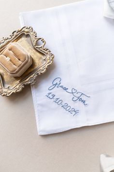 Our luxury men's cotton handkerchief, embroidered with happy couples names and cute heart design. Can be embroidered in a choice of colours. You can choose to have date embroidered below the names. Handkerchief is presented in lovely gift box, with gift tag - ready to give straight to the special man in your life. Made from 100% cotton, our embroidered handkerchief would make a lovely gift for your groom on the morning of your wedding, an ideal cotton anniversary gift and wonderful Christmas and Classic Blue Handkerchiefs For Gift, Personalized Cotton Handkerchiefs, Classic Cotton Handkerchiefs As Gift, Classic Embroidered Handkerchiefs For Wedding Gift, White Embroidered Handkerchiefs For Special Events, Embroidered Text Cotton Handkerchiefs For Gifts, Cotton Handkerchiefs With Embroidered Text For Gift, Cotton Handkerchiefs With Embroidered Text As Gift, Cotton Handkerchief With Machine Embroidery For Gift