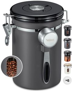 an electric coffee maker is shown with four different types of beans in front of it