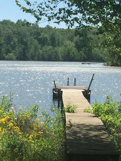 a dock sits on the edge of a body of water