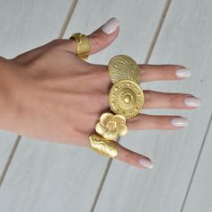 ❀ I made this 14K gold ring for you, to make you look elegant. A Unique gold ring that can fit perfectly to all styles. You will look elegant when you wear this Stylish ring. Dainty gold ring stands out with flashy designs. If you have a modern and rebellius style, this Signed ring is for you ❀ It is a Wide gold ring with sterling silver plated matte finish. ❀ All the gold rings are adjustable in the back. Rings are easy to adjust and would fit fingers size US 4 and up ❀ If you are looking for a Gold Engraved Open Ring In Recycled Gold, Gold Engraved Open Ring In Recycled Material, Bohemian 14k Yellow Gold Rings, Bohemian Brass Stackable Rings, Adjustable Gold Heirloom Midi Rings, Gold Engraved Stackable Open Ring, Handmade 14k Gold Bohemian Jewelry, Elegant Gold Rings With Unique Variations, Bohemian 14k Gold Ring Jewelry