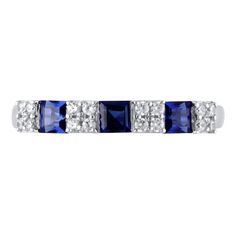 Tasteful and refined, this gemstone and diamond ring is certain to become your favorite go-to look. Created in 10K white gold, this choice features a trio of 3.0mm princess-cut bright blue sapphires. Quartets of shimmering diamonds in square shapes complete the alternating pattern. Radiant with 1/6 ct. t.w. of diamonds and a brilliant buffed luster, this ring complements your minimalist style. Sapphire Diamond Rings With Channel Set, White Gold Diamond Ring With Lab-created Sapphire Accent Stones, Formal White Gold Diamond Ring With Lab-created Sapphire, Fine Jewelry Sapphire Ring With Channel Set Diamonds, Baguette Cut Sapphire Ring Channel Set, Lab-created Sapphire Rings With Diamond Accents, Fine Jewelry Rings With Diamond Accents And Lab-created Sapphire, Channel Set Sapphire White Gold Rings, Elegant Lab-created Sapphire Ring With Channel Set