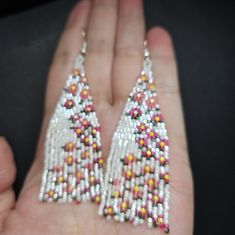 These Handmade Pink Cascading Floral Beaded Earrings Were Woven With Japanese Glass Delica Beads. Each Bead Is Woven One By One To Create This Design. This Process Requires A Lot Of Focus And Patience As It Can Take Several Hours To Complete. They Measure Approximately Inches In 2.5 Length And 1 Inch In Width. White Faceted Beads Beaded Earrings Gift, White Faceted Beaded Earrings As A Gift, Traditional White Beaded Fringe Jewelry, White Dangle Earrings With Faceted Beads, Elegant White Dangling Beads, White Dangling Beads For Jewelry Making, White Beaded Earrings With Round Tiny Beads, White Beaded Earrings With Faceted Round Beads, White Dangling Beads For Gifts