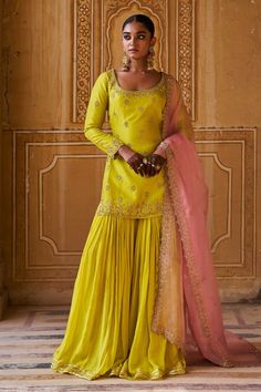 Yellow dupion silk kurta with dori and aari hand embroidery. Comes with sharara and an organza dupatta. - Aza Fashions Festival Silk Palazzo Set With Gota Work, Eid Art Silk Sharara With Dori Work, Silk Sharara With Resham Embroidery And Straight Kurta, Silk Sharara With Straight Kurta And Resham Embroidery, Festive Silk Sharara With Dori Work, Traditional Silk Sharara With Gota Work, Tissue Silk Sharara With Resham Embroidery For Festivals, Embroidered Silk Sharara With Straight Kurta, Resham Embroidery Sharara In Tissue Silk For Festivals