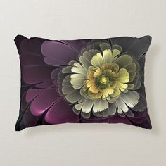 a purple and yellow flower on a black background pillow shampoos with the image of an abstract flower