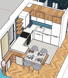 an overhead view of a kitchen and dining room in a small house with wood floors