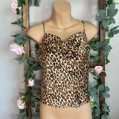 This Zara Camisole Offers A Perfect Blend Of Style And Comfort. Size Medium Nwt It Features A Fun, Leopard Print Pattern And Sleeveless Design For A Unique And Stylish Look. Crafted From Lightweight Polyester Fabric, This Camisole Gives You All-Day Comfort By Keeping You Cool And Comfortable. Experience A Refreshing New Style For This Season And Make A Statement With This Amazing Piece Of Apparel. - Zara Leopard Print - Sleeveless Camisole - Polyester - Camisole. - Adjustable Strap - Gold Straps Beige Sleeveless Crop Top For Night Out, Beige Sleeveless Crop Top With Built-in Bra, Sleeveless Beige Crop Top With Built-in Bra, Brown Summer Camisole Cami, Brown Summer Camisole, Brown Sleeveless Tank Top For Night Out, Sleeveless Brown Tank Top For Night Out, Brown Sleeveless Top For Night Out, Sleeveless Brown Tops For Night Out