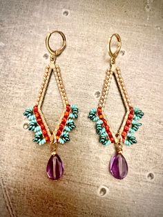 Ready to ship hand beaded earrings that give all the Boho vibes! This beautiful set is created with vibrant colored seed beads and high quality amethyst gemstones on brass findings that give all the Boho vibes.   The earwires are either raw brass or  hypo-allergenic Niobium, are nickel-free and lead-free. Multicolor Beaded Brass Earrings, Bohemian Gold Beaded Crystal Earrings, Multicolor Dangling Beaded Brass Earrings, Gold Bohemian Beaded Earrings With Faceted Beads, Purple Dangle Earrings With Tiny Beads, Bohemian Gold Earrings With Faceted Beads, Bohemian Crystal Earrings With Faceted Beads, Handmade Bohemian Crystal Earrings, Bohemian Beaded Crystal Earrings