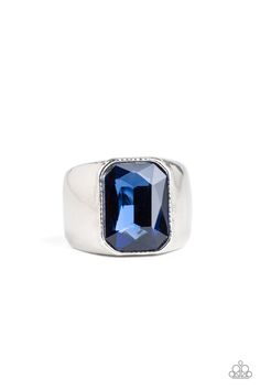 Featuring a kingly emerald style cut, an oversized blue rhinestone is pressed into the center of a glistening silver band for a statement look. Features a stretchy band for a flexible fit. Sold as one individual ring. P4MN-URBL-003XX Emerald Style, Blue Ring, Rhinestone Ring, Mens Silver Rings, Paparazzi Accessories, Blue Gems, Unisex Ring, White Rhinestone, Silver Bars