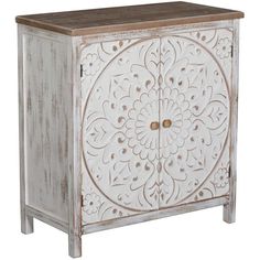 an ornate white cabinet with wood top