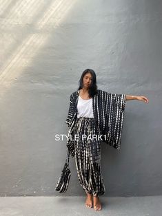 Summer Cotton Sets With Kimono Sleeves, Cotton Sets With Kimono Sleeves For Summer, Traditional Summer Wrap Kaftan, Traditional Beach Sets For Spring, Traditional Spring Beach Sets, Traditional Long Kimono For Summer, Traditional Summer Beach Sets, Black Cotton Kimono For Summer, Black Relaxed Fit Sets For Vacation