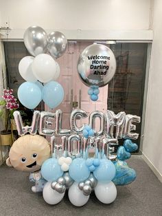 welcome home balloon decoration with balloons in the shape of animals