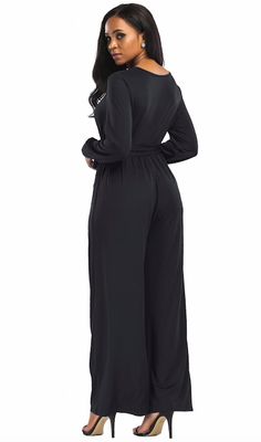 This simply chic jumpsuit is simply perfect. Featuring a wrap-style front with long cuffed sleeves, flare legs, a cinched sash-belted waist and a plunging v-neckline. This jumpsuit pairs perfectly with heels, wedges, sandals or booties. Made with a polyester and spandex blend for comfort and style. Comes in four fabulous colors from which to choose. Fitted Belted Jumpsuits And Rompers In Solid Color, Fitted Solid Color Belted Jumpsuits And Rompers, Solid Color Belted Fitted Jumpsuits And Rompers, Party Long Sleeve Jumpsuit With Tie Waist, Solid Maxi Length Jumpsuits And Rompers For Loungewear, Maxi Length Jumpsuits And Rompers For Loungewear, Chic Full Length Jumpsuits And Rompers For Loungewear, Chic Belted Jumpsuits And Rompers, Elegant Solid Color Jumpsuits And Rompers For Fall