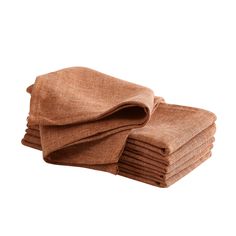 six brown linen napkins stacked on top of each other