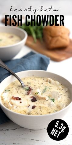 there is a bowl of fish chowder on the table