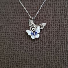 Brand New With Tags Cote D'argent Duo Butterfly Pendant Necklace Excellent Condition With No Flaws Approx Chain Length 18" (No Extender) Approx Pendant Drop 1-1/8" 925 Sterling Silver White And Blue Enamel Butterfly With A Pave Cubic Zirconia Body Set On An Open Silver Butterfly Outlined With Cubic Zirconia With A Pave Cubic Zirconia Body Lobster Clasp Closure Please No Trades Or Lowballs! *Ask Any Questions You May Have Prior To Making An Offer Or Purchase Please* Leo Necklace, Rose Quartz Serenity, Genuine Pearl Necklace, Enamel Butterfly, Floral Statement Necklace, Mesh Necklace, Multi Chain Necklace, Cubic Zirconia Necklace, Bow Necklace