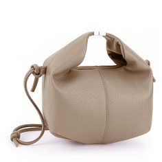 PRICES MAY VARY. 【Cruelty-Free Material】This dumpling shoulder bag is crafted from vegan leather that is both environmentally friendly and cruelty-free. If there is any smell, please ventilate it and leave it for a while to dissipate. 【Chic and Trendy Design】This chic luxury designer top handle handbag is crafted with PU fabric, featuring a stylish lychee grain leather design that adds a touch of sophistication to your look. 【Versatile Carrying Options】You can carry this vegan leather bag by han Designer Top, Pu Fabric, Designer Clutch, Vegan Leather Bag, Top Handle Handbags, Handle Bag, Shoulder Tote, Leather Design, Luxury Designer