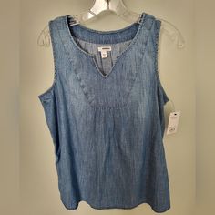 New With Tags Size: Medium Color: Chambray Blue Material: 100% Cotton Sleeveless, Tank, V Neck Notch Neckline Approx. Measurements: 19" Armpit To Armpit 25.5" In Length Browse My Closet For More Likes To Bundle And Pay One Shipping Bin: A5 Casual Sleeveless Medium Wash Top, Casual Medium Wash Sleeveless Top, Spring Sleeveless Medium Wash Tops, Light Wash Sleeveless Beach Tops, Medium Wash Sleeveless Tops For Spring, Light Wash Sleeveless Tops For Beach, Sleeveless Medium Wash Tops For Beach, Medium Wash Cotton Top For Beach, Medium Wash Cotton Tops For The Beach