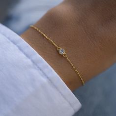 "Super cute bezel bracelet is great for layering or worn on its own! Delicate & dainty this is perfect for a minimalist look :) - - - D E T A I L S - - -  * Made of 925 Sterling Silver * THICK plating of 14k Gold or Rhodium  * Available in 6.25\", 6.75\" + .5\" Ext Chain lengths * 4mm Bezel * Nickel-free & Hypoallergenic  * Lobster clasp closure with extension chain  Bracelets on Model: TENNIS BRACELET --> https://www.etsy.com/listing/899893520/tennis-bracelet-gold-tennis-bracelet? click_key=7b87b1a3c5a7ba74e2318e00058ba68f4b95e9ad%3A899893520&click_sum=5ad98715&ga_search_query=tennis%2Bbracelet&ref=shop_items_search_3&pro=1&sts=1 Beaded Bracelet --> https://www.etsy.com/listing/1330606182/beaded-bracelet-dainty-bracelet?click_key=1ddd85cabdfc074c2afb8a761e05b152f0e045ab%3A1330606182&click Dainty Adjustable Diamond Bracelet With Strap, Minimalist Diamond Bracelet With Adjustable Fit, Dainty Chain Bracelet With Bezel Setting As Gift, Minimalist Gold Bracelet With Bezel Setting For Gift, Dainty Adjustable Bracelet With Bezel Setting, Minimalist Gold Bracelet With Bezel Setting, Dainty Chain Bracelet With Bezel Setting, Gold Bracelets With Bezel Setting For Everyday, Dainty Gold Bracelet With Bezel Setting For Gift