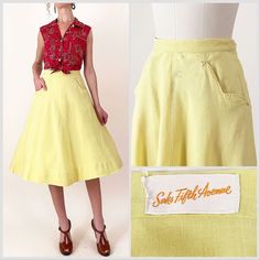 1950s Saks Fifth Avenue lemon yellow linen skirt. Scalloped pockets with western stitching details. Metal side zipper with hook closures at the waist. Slightly sheer. Shown with a petticoat underneath (not included). In great vintage condition - please see photos.  All measurements are taken with the garment laying flat and doubled for the bust, waist, and hips.  Waist: 27" Hips: 50" Length: 27" Label: Saks Fifth Avenue Material: Not listed; looks/feels like linen Size on Tag: N/A Approx. Fit: 2 Vintage Yellow Cotton Skirt, Vintage Fitted Skirt With Pockets, Fitted Vintage Skirt With Pockets, Vintage Skirt With Pockets, Yellow Circle, Horse Vintage, Stitching Details, Cat Walk, Linen Skirt