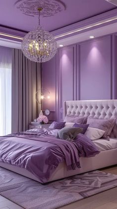 a bedroom decorated in purple and white with a chandelier hanging from the ceiling