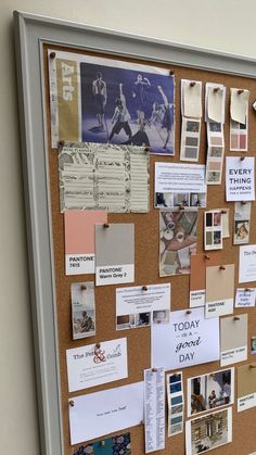 a bulletin board covered in papers and pictures with magnets on it's side