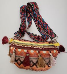 Multicolor Fringe Crossbody Bag, Casual Fringe Shoulder Bag For Festivals, Red Tasseled Travel Bags, Red Travel Bag With Tassels, Trendy Multicolor Fringe Bag, Festival Multicolor Fringe Bags, Bohemian Multicolor Shoulder Bag With Tassels, Multicolor Festival Bags With Fringe, Multicolor Fringe Bags For Festival