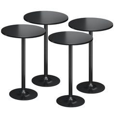 three black tables sitting next to each other