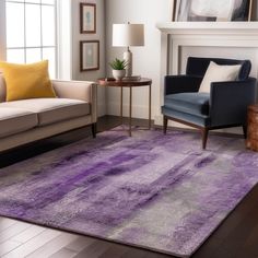 a living room filled with furniture and a purple rug