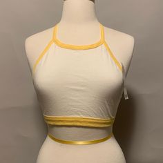 White And Yellow Tie Halter Crop Top. New With Tags Trendy White Racerback Halter Top, Summer White Racerback Crop Top, White Racerback Crop Top For Summer, White Stretch Halter Top For Summer, White Racerback Halter Top For Summer, Urban Outfitters Fitted Halter Top For Beach, Yellow Fitted Halter Neck Crop Top, Urban Outfitters Summer Halter Neck Top, Urban Outfitters Halter Neck Top For Beach