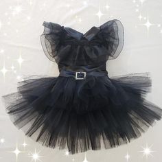 Wednesday Adams inspired sequin tutu romper dress is perfect for Birthday, Cake smash photo shoot, Halloween costume or any special occasion. Note: Headband and other accessories NOT included. All of our products are made to order, handmade original designs with professional finish and quality fabrics.  If you are interested in a different size feel free to contact our shop, additional fees will be applied for customization.   Please note, all custom orders are made according to the measurements Princess Style Tutu Dress For Holiday Costume Party, Christmas Party Tutu Dress In Tulle, Christmas Tulle Princess Dress For Costume Party, Christmas Party Tulle Tutu Dress, Black Ruffled Tutu Dress For Costume Party, Tulle Fairy Dress With Ruffles For Costume Party, Holiday Tutu Dress With Ruffles For Dress-up, Holiday Ruffle Tutu Dress For Dress-up, Fitted Tutu Dress With Ruffles For Costume Party