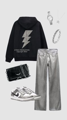 a black hoodie, silver jeans and white sneakers are featured in this fashion photo