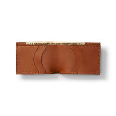 Classic, American made bi-fold wallet. This USA-made wallet is constructed with premium Horween leather and features four card slots in addition to a single bill pocket. Classic Bifold Wallet With Coin Pocket, Bifold Wallets For Daily Use, Classic Bifold Coin Purse For Everyday, Classic Brown Bifold Coin Purse, Classic Bifold Coin Purse For Daily Use, Brown Bifold Card Holder With Coin Pocket, Classic Bifold Coin Purse With Card Slots, Classic Trifold Coin Purse For Everyday Use, Classic Leather Bifold Coin Purse