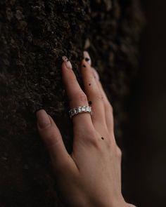 Get your sparkle on with the Rêvasser Ring—a diamond eternity ring to make all your friends say “ooh-la-la”! Strut about town in that subtle-but-glamorous way you do, and bask in the compliments this dazzling piece of jewelry will bring you. Rêvasser Ring means Daydream in French. This dreamy stackable ring is prefect to add to your collection. Cubic Zirconia 4x6mm set in silver. Promise Baguette Cut Diamond Jewelry, Promise Jewelry With Diamond Accents And Asscher Cut, Promise Jewelry With Asscher Cut Diamond Accents, Baguette Cut Jewelry With Diamond Accents For Promise, Asscher Cut Jewelry With Diamond Accents For Promise, Promise Ring With Asscher Cut Diamond Accents, Dazzling Baguette Cut Half Eternity Jewelry, Emerald Cut Diamond Eternity Band For Promise Ring, Promise Jewelry With Diamond Accents Princess Cut