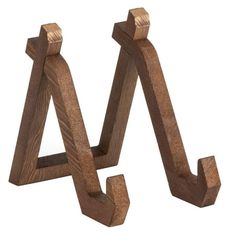 two wooden letters that are standing next to each other