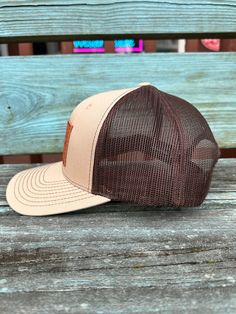 Description Check out the new Painted Cowgirl Western Store unisex trucker style ball cap. It is beige on brown, brown stitching on bill, 6 panel cap with a brown leather patch and the logo on the front. This is a must have to add to your ball cap collection. One size fits most. Beige Flat Bill Trucker Hat For Outdoor, Brown Six-panel Outdoor Hats, Adjustable Six-panel Brown Baseball Cap, Brown Adjustable Six-panel Baseball Cap, Brown Flat Bill Baseball Cap For Outdoor, Brown Outdoor Baseball Cap, Casual Brown Baseball Cap With Curved Bill, Beige Snapback Trucker Hat For Outdoor, Beige Trucker Hat With Flat Brim