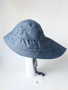 Original North German rain hats with long back brim to protect from rain. Rain Bonnet Vintage, Waterproof Wide Brim Bucket Hat For Outdoor, Waterproof Wide Brim Sun Hat For Travel, Adjustable Waterproof Bucket Sun Hat, Wide Brim Waterproof Hat For Outdoor Activities, Waterproof Wide Brim Hat For Outdoor Activities, Waterproof Wide Brim Summer Hat, Waterproof Wide Brim Bucket Hat With Adjustable Fit, Waterproof Wide Brim Sun Hat For The Beach