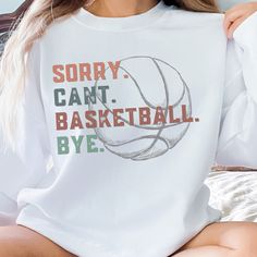 Welcome to SierraAlpineDesigns shop. This busy basketball season have fun in this funny Sorry Cant Basketball Bye Shirt/Sweatshirt. As you run from practice to games a few hours away this is the perfect shirt to let everyone know your in the busy season! Great gift for those sports parents, Aunts, Uncles or siblings.   PRODUCT INFORMATION * Please check the size chart in the product photos for more information about the fiber content for each style and color. * This listing is for the item liste Varsity Sports Hoodie With Letter Print, Athletic Heather Sweatshirt For Sports Fans, Collegiate Moisture-wicking Sweatshirt For Sports, White Sporty Sweats For College, Athletic Heather Team Spirit Sweatshirt For Sports, Team-colored Sweatshirt For Sports Season, Basketball Letter Print Sportswear Tops, Collegiate Sweatshirt For Sports Season, Basketball Sportswear Tops With Letter Print