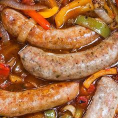 several sausages and peppers are in a stew