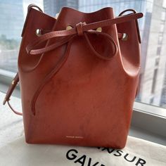 Good Condition And Perfect Bag For Fall, Summer, Spring! Leather Has Some Marks And Scratches As Shown In Photos. Comes With Original Dust Bag. Height: 10.5”. Width: 7.5” Mansur Gavriel Bucket Bag, Mansur Gavriel Bag, Mansur Gavriel, Perfect Bag, Bucket Bag, Dust Bag, Bag Lady, Shoulder Bag, Cream